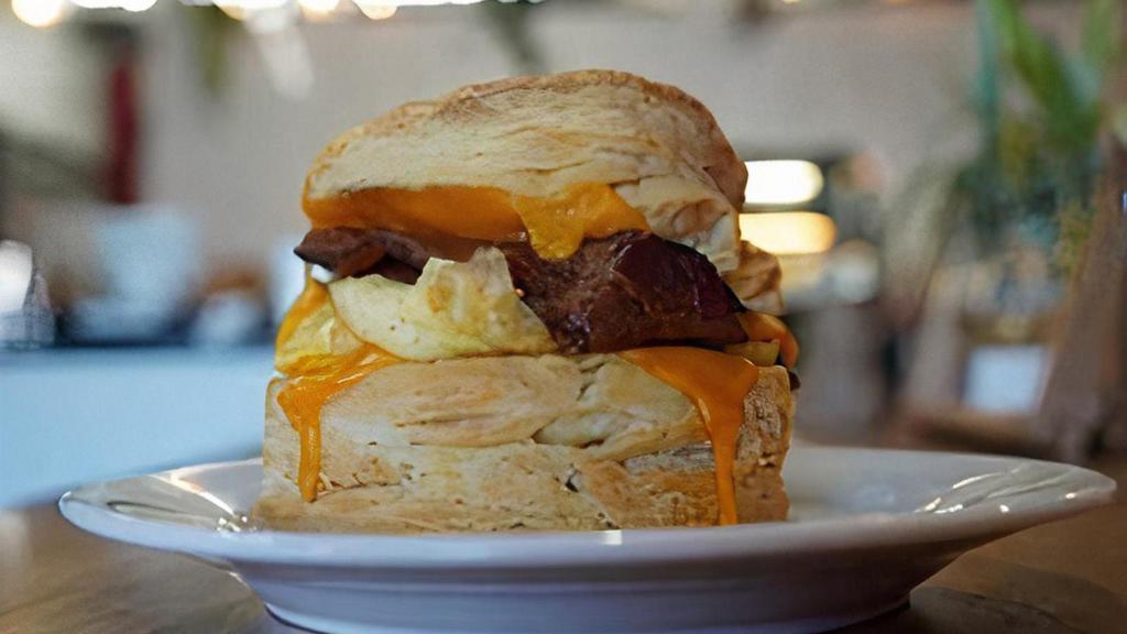 Breakfast Biscuit Sandwich · Homemade biscuit with cheddar cheese and your choice of ham, bacon sausage, or veggie sausage