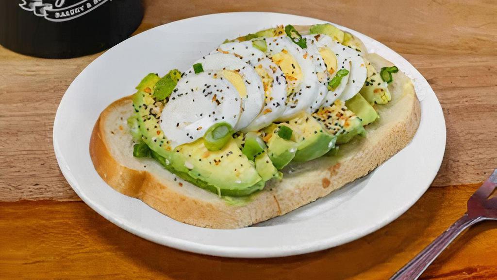 Avocado Toast · Your choice of bread toasted with butter and topped with fresh avocado, hardboiled egg, green onions, and sprinkled with everything seasoning