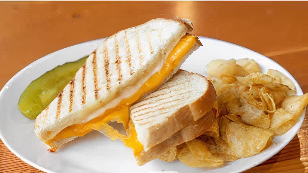 Grilled Cheese Sandwich · Made with cheddar and white cheddar cheese