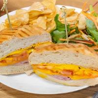 Ham & Cheddar Panini · Shaved ham with cheddar, sliced tomatoes and mustard aioli