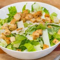 Caesar Salad · Traditional Caesar Salad made with chopped romaine, shaved parmesan, herb toasted croutons a...
