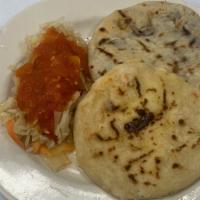 Pupusas · Homemade corn tortilla stuffed with your choice of pork & cheese, beans & cheese, or just ch...