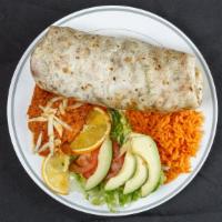 Burrito Dinner · Stuffed with meat of your choice, rice, beans, lettuce, tomato, onions, cheese, and sour cre...