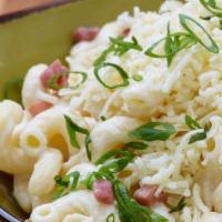 Mac' & Cheese · Fontina, cheddar and ricotta cheese sauce with cavatappi noodles, country ham and scallions