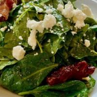 Arugula Salad · bacon, pickled onion, Parmesan, cornbread croutons, red pepper ranch