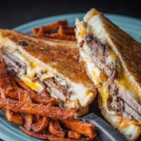 Brisket And Egg Grilled Cheese · Brisket, onions, garlic, and an egg stuck between cheese and bread sounds normal, it’s not. ...