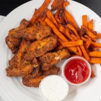 Cajun Wing Basket · Savory and sassy just like you like’em. Don’t worry, they won’t make your ears burn.