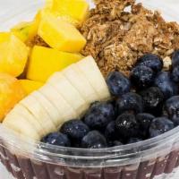 Acai Bowl · Acai blended with banana with three choice of toppings/fruits.