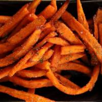Sweet Potato Fries · Crispy sweet potato fries topped with salt and dried parsley.
