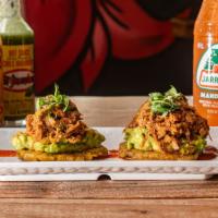 Tostones De Rora Vieja · Fried plantain topped with smashed avocado and Cuban styled ropa vieja.