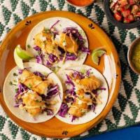 Baja Fish Tacos (3 Pack) · A baja style fish taco featuring battered and fried cod, red cabbage slaw, chipotle mayo and...
