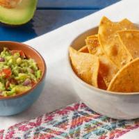 Chips & Guac · House-made corn tortilla chips served with our creamy guacamole.