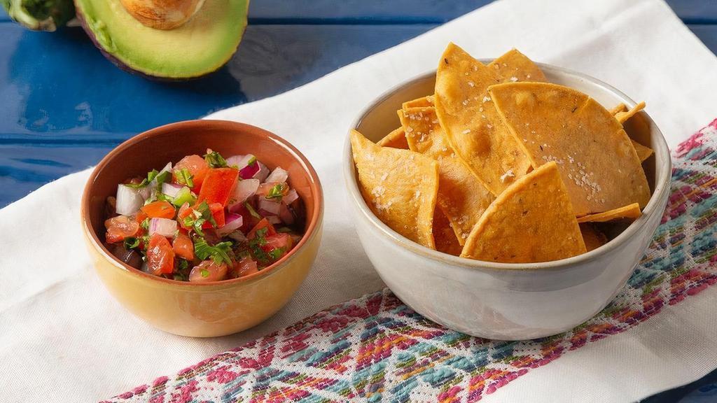 Chips & Salsa · House-made corn tortilla chips served with your choice of Pico de Gallo, Salsa Roja, or Salsa Verde.
