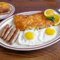 Link Sausage & Eggs · Four sausage links with two eggs any style, served with four buttermilk pancakes.