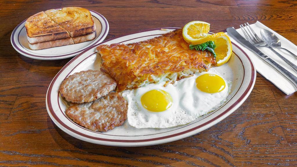 Country Sausage & Eggs · Two country sausage patties with two eggs any style, served with four buttermilk pancakes.