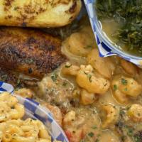 Cajun Platter · Dirty rice, etouffee, greens, crawfish, mac & cheese, fried or blackened fish, & toast