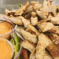 Grilled Chicken Salad · Freshly prepared grilled chicken over fresh salad with one dressing cup.