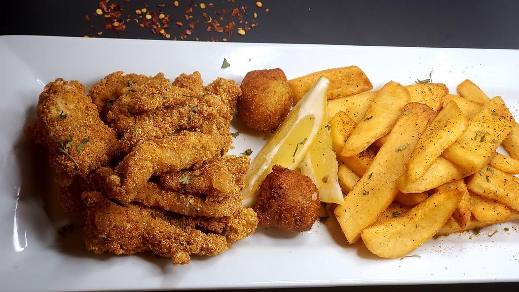 Fried Catfish Nuggets · 10 hand-battered fish nuggets, two hush puppies, and fries with bread, jalapeños and peppers.