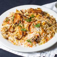 Chicken Biryani · Famous Basmati Rice with Tender Chicken pieces with Mild spices