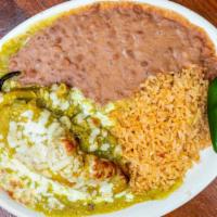 Chile Relleno · Poblano pepper stuffed with your choice of ground beef, chicken or jack cheese. Topped with ...