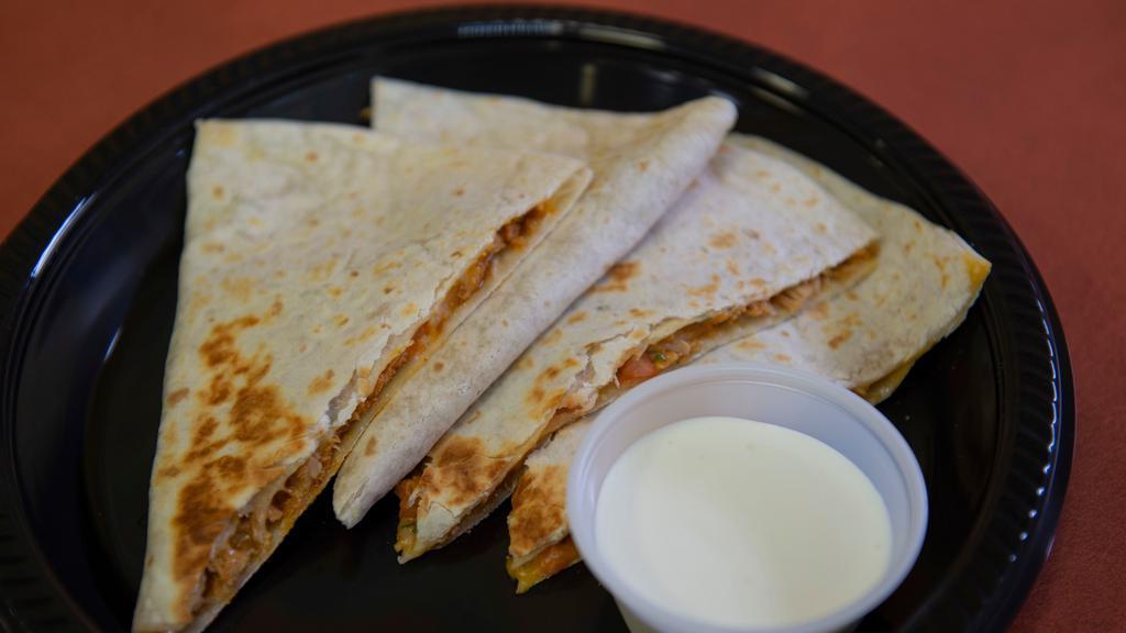 Kids Quesadilla · Kids Quesadilla , with chips or a cookie and kids drink or milk.