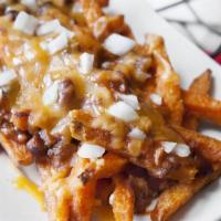 Bulgogi Fries · Our signature bulgogi seasoned meat on top of straight cut crispy fries, a sprinkle of chees...