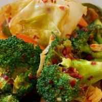 Spicy Mixed Vegetables · Broccoli carrot cabbage zucchini mushrooms  with homemade spicy sauce