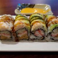 Saki Roll (8Pcs) · Shrimp tempura, cucumber, crab meat, mayo top with Avocado, shrimp, tobiko and eel sauce.