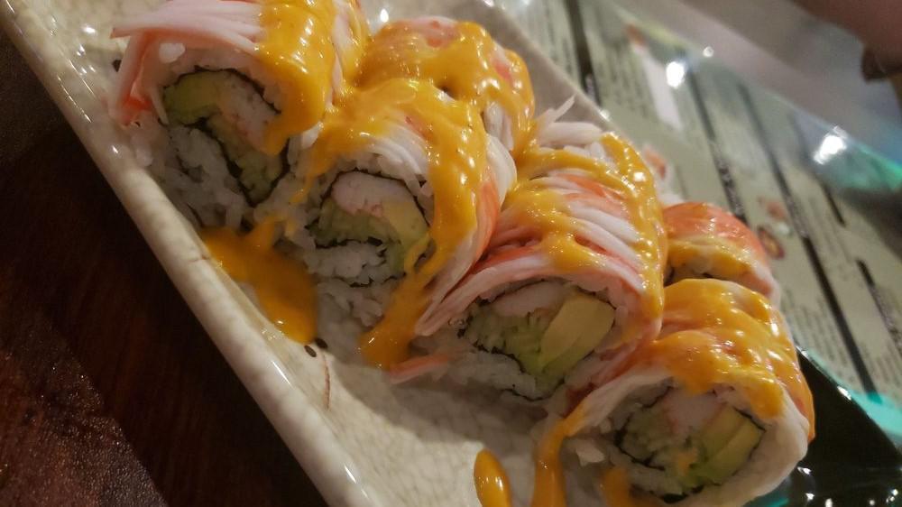 Volcano Roll (8Pcs) · California roll, baked crabmeat, and mayo on top.