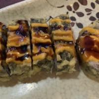 Hawaii Roll (6Pcs) · Salmon cream cheese inside seaweed outside tempura with Eel sauce and spicy mayo.