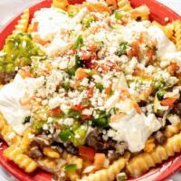 Mexican Steak Fries · French fries topped with grilled steak, guacamole, pico de gallo, sour cream, cheese dip and...