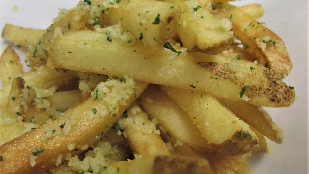 Truffle Parm Fries · French fries topped with truffle and parmesan cheese.