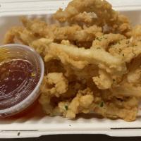 Calamari · Battered, deep-fried with sweet and sour dipping.