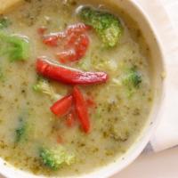 Broccoli Soup With Cheese · Broccoli and  cheese  with a touch of cream. And butter