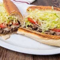 Steak & Cheese Supreme · With mushrooms, fried onions, green peppers, lettuce, tomato & mayonnaise