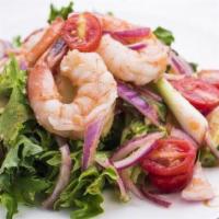 Yum Salad* · Gluten-free. A zesty salad tossed with cucumber, tomatoes, lettuce, red onions, spring onion...