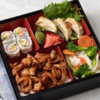 Chicken Bento · Served with Steamed Rice, Vegetable, Dumplings (3), and spring roll (1)