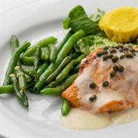 Atlantic Salmon · Pan broiled and served with a lemon dill beurre blanc sauce with capers.