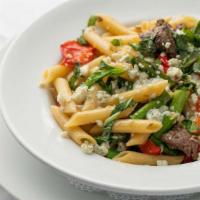 Filet Mignon Pasta · Penne with asparagus, mushrooms, red peppers and filet mignon with a garlic butter sauce and...