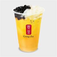 Qq Passionfruit Green Tea · Includes Pearl and Coconut Jelly