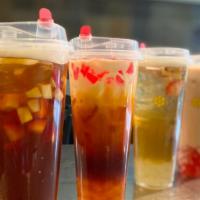 Passion Fruit Tea · Passion Fruit Tea, lightly sweetened passion tea w/mixed fruit & lychee jelly |  ICED