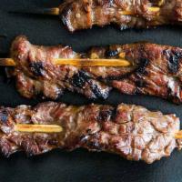 Grilled Lemongrass Beef On Skewer(2) · Flank steak marinated with lemongrass and herbs; grilled to perfection.