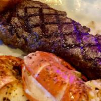 New York Strip · 12 oz Chargrilled Grilled New York Strip.  Includes a choice of one side and a salad.