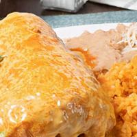 Chimichanga · Fried flour tortilla, stuffed with meat (Chicken or Ground 
Beef) Bathed with red sauce and ...