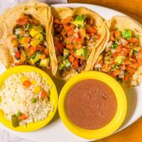 Chef’S Tacos · Three corn tortillas individually filled with: beef steak, grilled chicken, and beef tongue....