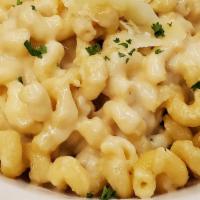 Homemade Mac And Cheese · Cavatappi pasta baked in a Parmesan, Gouda and Sharp cheddar cheese sauce.