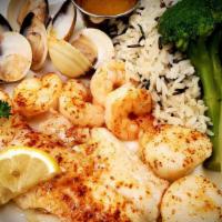 Baked Seafood Platter · Scallops, shrimp, haddock and baby little neck clams.
Baked with paprika, garlic butter and ...