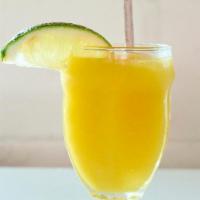 House Seasonal Fruit Frozen To Go · Current offering - Mango frozen marg, served in our 16oz stadium cup