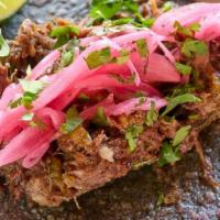 Barbacoa Tacos (2) · Braised Beef Cheek/Salsa Habanero/Pickled Onion/Cilantro House Made Oaxaca Blue Corn Tortillas
