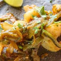 Camarones Pibil Tacos (2) · Achiote Shrimp, Molcajeta Salsa, Chipotle Slaw, Cilantro & Onion. *Contains Clarified Butter